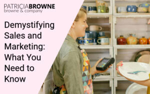 woman building her profitable business by demystifying sales and marketing